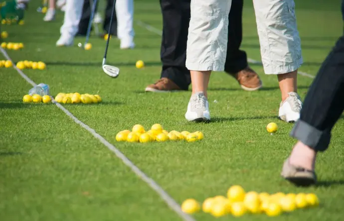 Golfers at the driving range